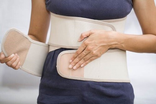 A person with a back brace | Chiropractic Ann Arbor